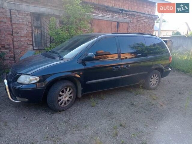 Черный Крайслер Вояджер, объемом двигателя 2.5 л и пробегом 390 тыс. км за 2800 $, фото 3 на Automoto.ua