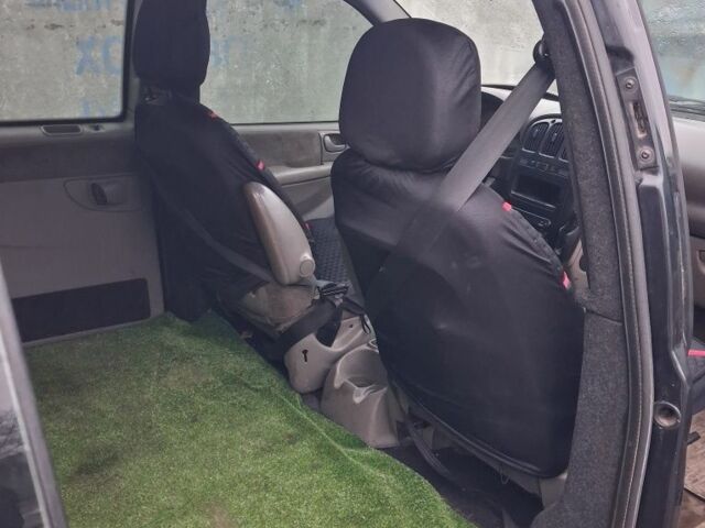 Черный Крайслер Вояджер, объемом двигателя 2.5 л и пробегом 1 тыс. км за 1538 $, фото 4 на Automoto.ua