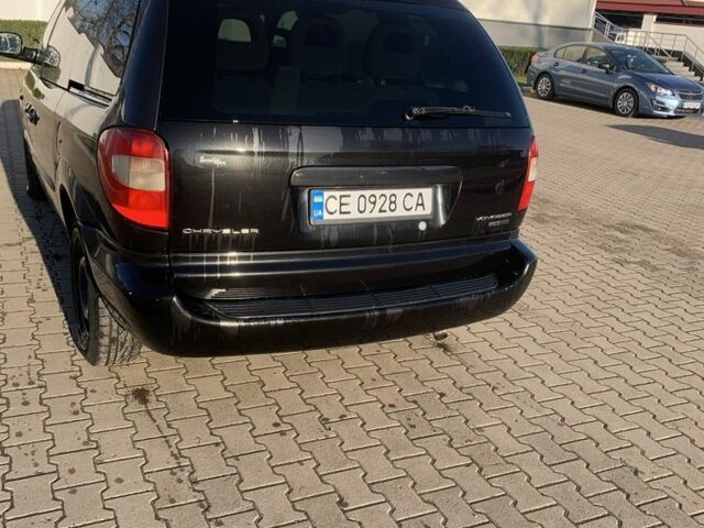 Черный Крайслер Вояджер, объемом двигателя 2.5 л и пробегом 340 тыс. км за 2999 $, фото 5 на Automoto.ua