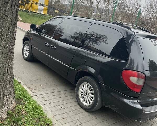 Чорний Крайслер Voyager, об'ємом двигуна 2.78 л та пробігом 284 тис. км за 6300 $, фото 7 на Automoto.ua