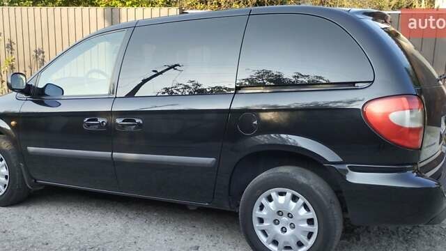 Черный Крайслер Вояджер, объемом двигателя 2.78 л и пробегом 195 тыс. км за 6500 $, фото 11 на Automoto.ua