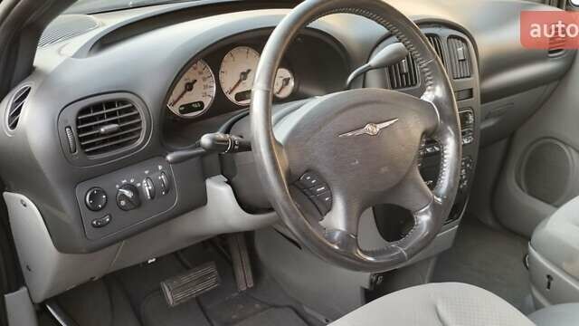 Черный Крайслер Вояджер, объемом двигателя 2.78 л и пробегом 195 тыс. км за 6500 $, фото 1 на Automoto.ua