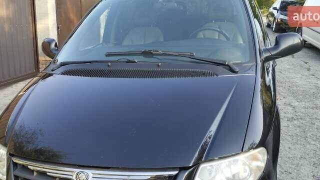 Черный Крайслер Вояджер, объемом двигателя 2.78 л и пробегом 195 тыс. км за 6500 $, фото 9 на Automoto.ua