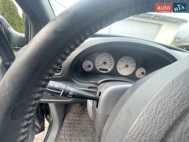 Серый Крайслер Вояджер, объемом двигателя 2.43 л и пробегом 313 тыс. км за 6500 $, фото 36 на Automoto.ua