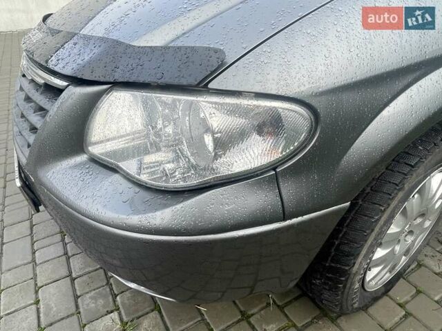 Серый Крайслер Вояджер, объемом двигателя 2.43 л и пробегом 313 тыс. км за 6500 $, фото 22 на Automoto.ua