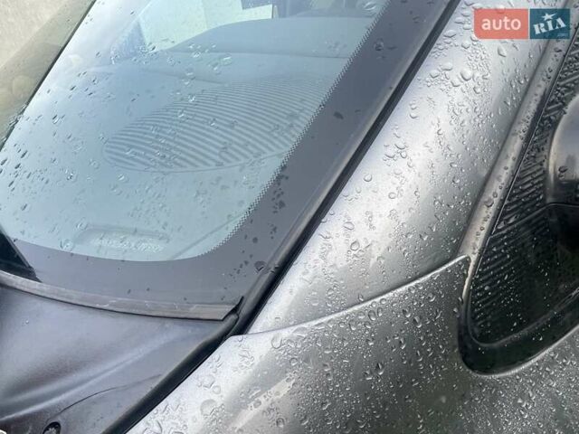 Серый Крайслер Вояджер, объемом двигателя 2.43 л и пробегом 313 тыс. км за 6500 $, фото 19 на Automoto.ua