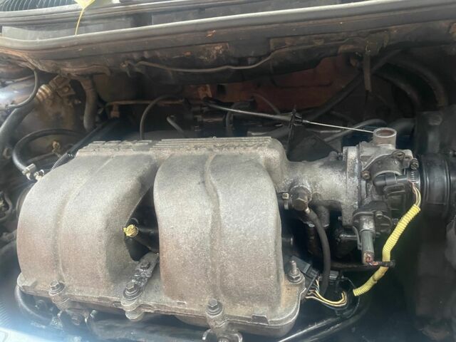 Сірий Крайслер Voyager, об'ємом двигуна 2.4 л та пробігом 20 тис. км за 1000 $, фото 10 на Automoto.ua