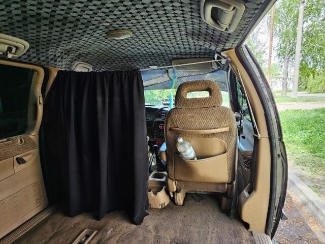 Серый Крайслер Вояджер, объемом двигателя 0 л и пробегом 400 тыс. км за 2172 $, фото 3 на Automoto.ua