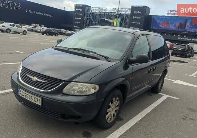 Серый Крайслер Вояджер, объемом двигателя 2.5 л и пробегом 420 тыс. км за 2800 $, фото 1 на Automoto.ua