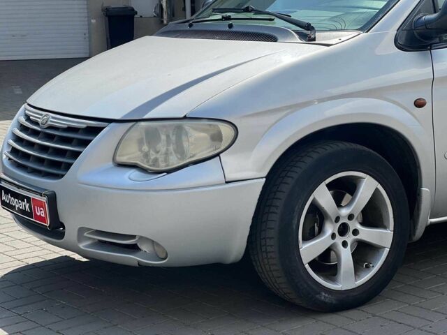 Серый Крайслер Вояджер, объемом двигателя 2.5 л и пробегом 396 тыс. км за 4640 $, фото 1 на Automoto.ua