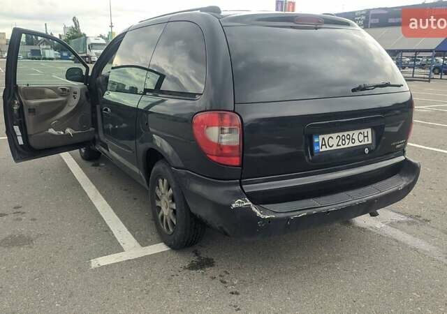 Серый Крайслер Вояджер, объемом двигателя 2.5 л и пробегом 420 тыс. км за 2800 $, фото 7 на Automoto.ua