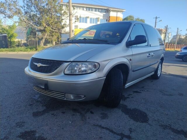 Серый Крайслер Вояджер, объемом двигателя 2.5 л и пробегом 183 тыс. км за 4105 $, фото 1 на Automoto.ua