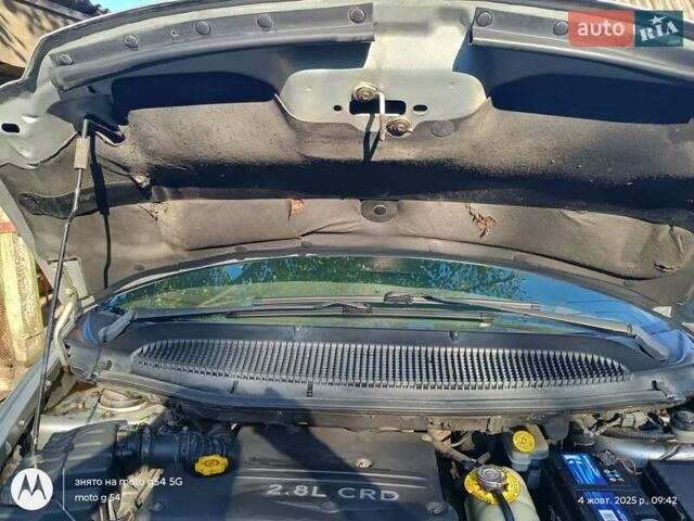 Сірий Крайслер Voyager, об'ємом двигуна 2.5 л та пробігом 312 тис. км за 4800 $, фото 3 на Automoto.ua