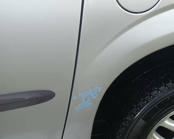 Сірий Крайслер Voyager, об'ємом двигуна 2.5 л та пробігом 312 тис. км за 4800 $, фото 19 на Automoto.ua