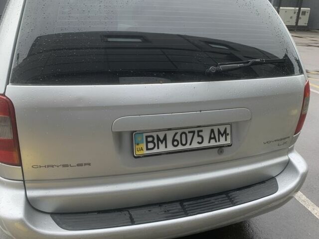 Серый Крайслер Вояджер, объемом двигателя 2.4 л и пробегом 176 тыс. км за 5600 $, фото 2 на Automoto.ua