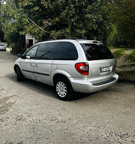 Сірий Крайслер Voyager, об'ємом двигуна 2.5 л та пробігом 395 тис. км за 2300 $, фото 3 на Automoto.ua