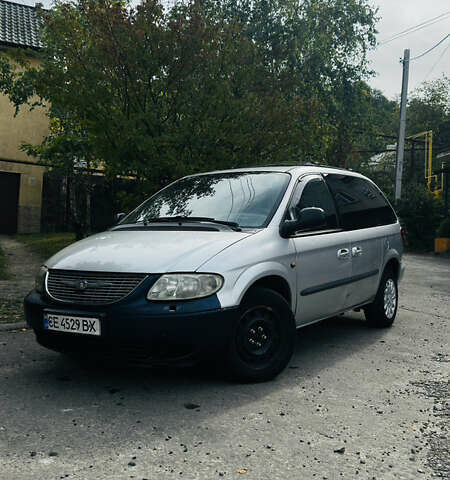 Сірий Крайслер Voyager, об'ємом двигуна 2.5 л та пробігом 395 тис. км за 2300 $, фото 1 на Automoto.ua