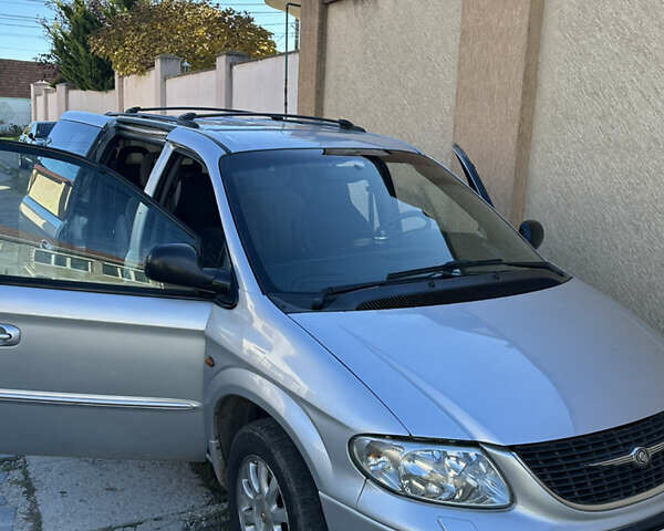 Крайслер Вояджер 2003 в Николаеве на Automoto.ua Серый Крайслер Вояджер, объемом двигателя 2.5 л и пробегом 380 тыс. км за 5200 $, фото 3 на Automoto.ua