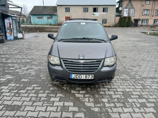 Сірий Крайслер Voyager, об'ємом двигуна 0 л та пробігом 234 тис. км за 1565 $, фото 1 на Automoto.ua