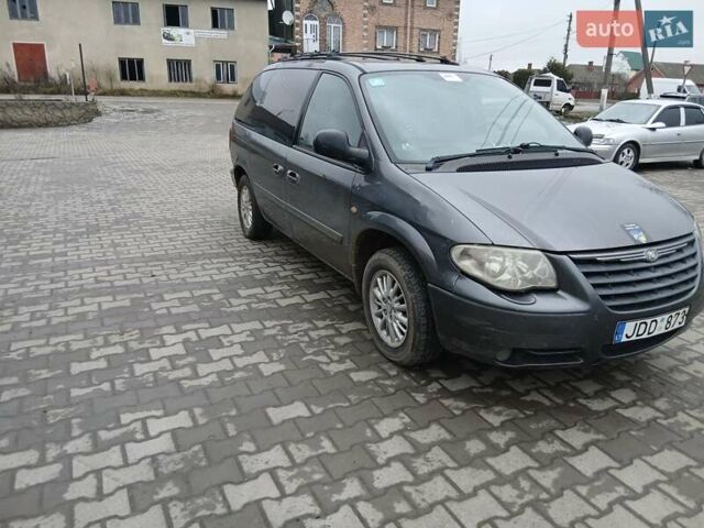 Серый Крайслер Вояджер, объемом двигателя 2.8 л и пробегом 231 тыс. км за 1350 $, фото 8 на Automoto.ua