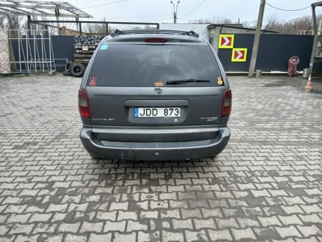 Сірий Крайслер Voyager, об'ємом двигуна 0 л та пробігом 234 тис. км за 1565 $, фото 4 на Automoto.ua