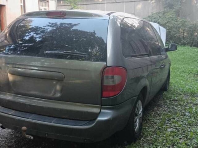 Сірий Крайслер Voyager, об'ємом двигуна 3.3 л та пробігом 300 тис. км за 1900 $, фото 3 на Automoto.ua