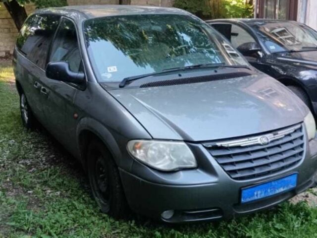 Сірий Крайслер Voyager, об'ємом двигуна 3.3 л та пробігом 300 тис. км за 1900 $, фото 4 на Automoto.ua