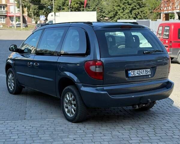 Сірий Крайслер Voyager, об'ємом двигуна 2.5 л та пробігом 446 тис. км за 5000 $, фото 4 на Automoto.ua
