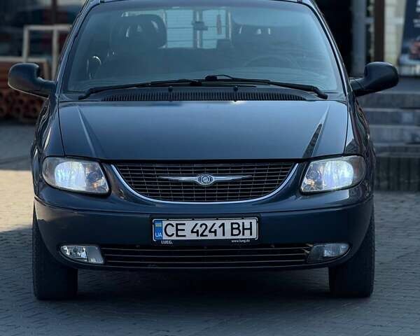 Сірий Крайслер Voyager, об'ємом двигуна 2.5 л та пробігом 446 тис. км за 5000 $, фото 2 на Automoto.ua