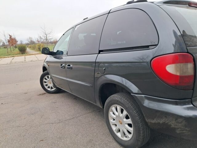 Синий Крайслер Вояджер, объемом двигателя 2.5 л и пробегом 3 тыс. км за 3547 $, фото 4 на Automoto.ua