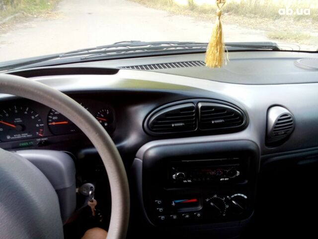 Крайслер Вояджер 1999 в Лубнах на Automoto.ua Зеленый Крайслер Вояджер, объемом двигателя 2 л и пробегом 300 тыс. км за 4150 $, фото 9 на Automoto.ua