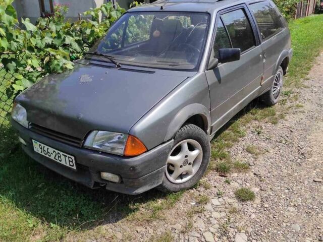 Серый Ситроен АХ, объемом двигателя 1.1 л и пробегом 322 тыс. км за 610 $, фото 1 на Automoto.ua