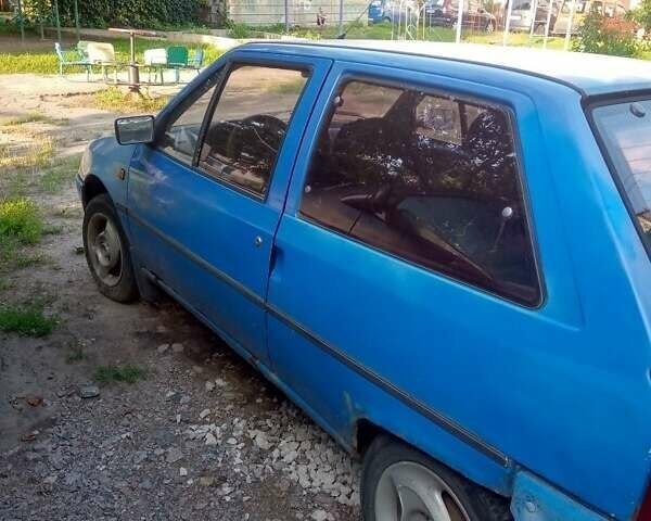 Синий Ситроен АХ, объемом двигателя 1 л и пробегом 270 тыс. км за 500 $, фото 3 на Automoto.ua