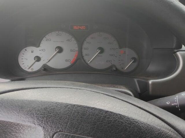 Чорний Сітроен Берлінго, об'ємом двигуна 1 л та пробігом 360 тис. км за 1659 $, фото 3 на Automoto.ua