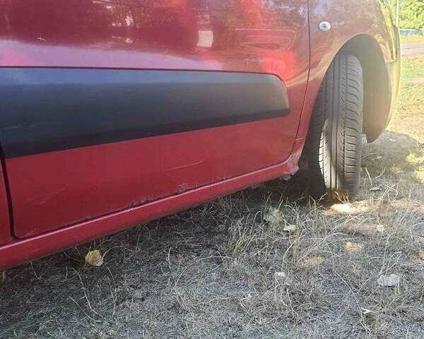 Красный Ситроен Берлинго пасс., объемом двигателя 1.59 л и пробегом 200 тыс. км за 4500 $, фото 6 на Automoto.ua