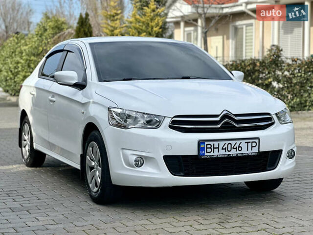 Белый Ситроен С-Элизе, объемом двигателя 1.2 л и пробегом 28 тыс. км за 7999 $, фото 11 на Automoto.ua