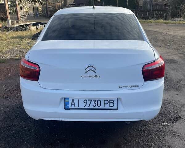 Белый Ситроен С-Элизе, объемом двигателя 1.2 л и пробегом 141 тыс. км за 6500 $, фото 5 на Automoto.ua