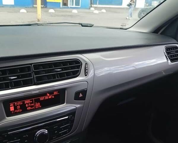 Белый Ситроен С-Элизе, объемом двигателя 1.2 л и пробегом 184 тыс. км за 6700 $, фото 6 на Automoto.ua