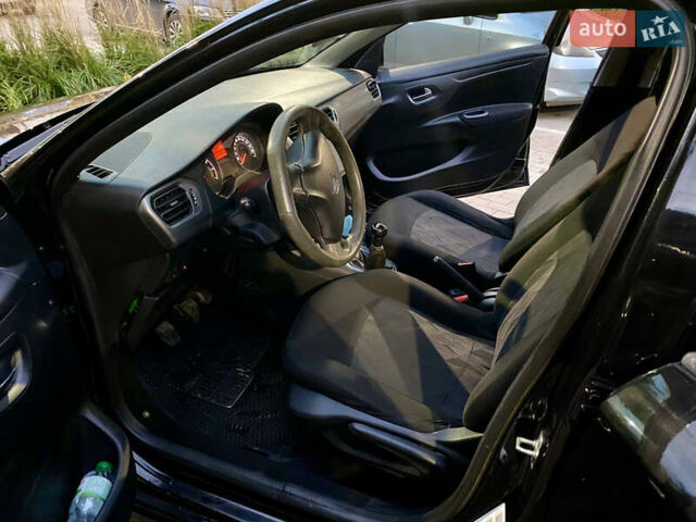 Черный Ситроен С-Элизе, объемом двигателя 1.2 л и пробегом 265 тыс. км за 3999 $, фото 10 на Automoto.ua