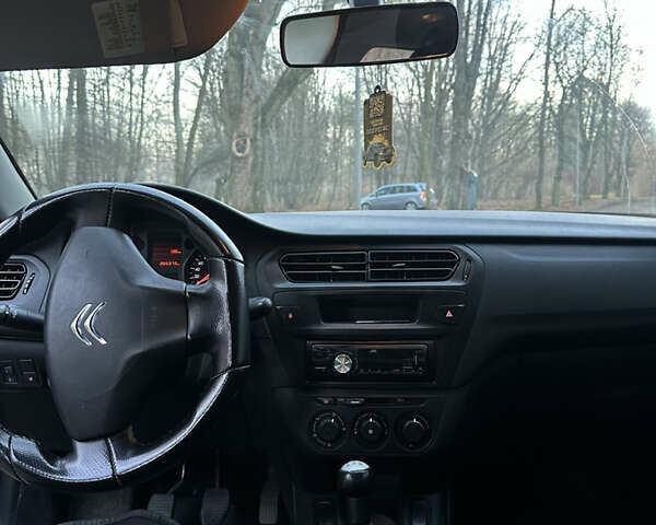 Серый Ситроен С-Элизе, объемом двигателя 1.2 л и пробегом 262 тыс. км за 3599 $, фото 13 на Automoto.ua