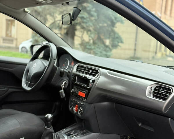 Синий Ситроен С-Элизе, объемом двигателя 1.2 л и пробегом 129 тыс. км за 3650 $, фото 8 на Automoto.ua