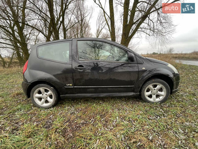 Чорний Сітроен С2, об'ємом двигуна 1.4 л та пробігом 161 тис. км за 2800 $, фото 1 на Automoto.ua