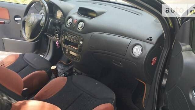 Черный Ситроен С2, объемом двигателя 1.4 л и пробегом 254 тыс. км за 5000 $, фото 11 на Automoto.ua