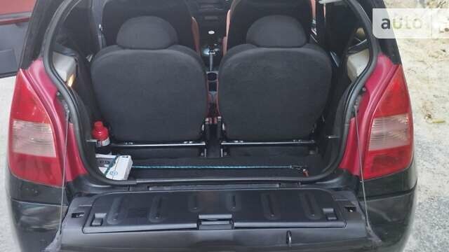 Черный Ситроен С2, объемом двигателя 1.4 л и пробегом 254 тыс. км за 5000 $, фото 27 на Automoto.ua