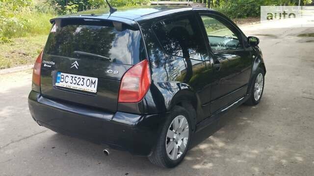 Черный Ситроен С2, объемом двигателя 1.4 л и пробегом 254 тыс. км за 5000 $, фото 5 на Automoto.ua