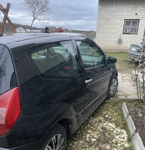 Чорний Сітроен С2, об'ємом двигуна 1.1 л та пробігом 283 тис. км за 2400 $, фото 5 на Automoto.ua