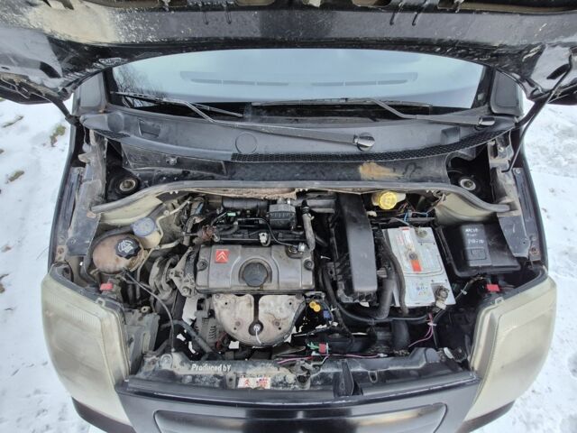 Черный Ситроен С2, объемом двигателя 1.1 л и пробегом 248 тыс. км за 2450 $, фото 3 на Automoto.ua