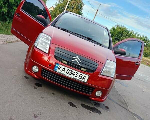 Красный Ситроен С2, объемом двигателя 1.4 л и пробегом 127 тыс. км за 3500 $, фото 1 на Automoto.ua