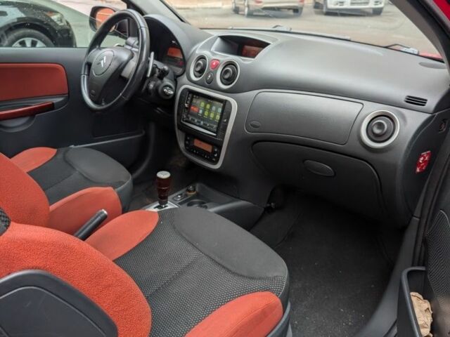 Красный Ситроен С2, объемом двигателя 1.4 л и пробегом 194 тыс. км за 3900 $, фото 1 на Automoto.ua