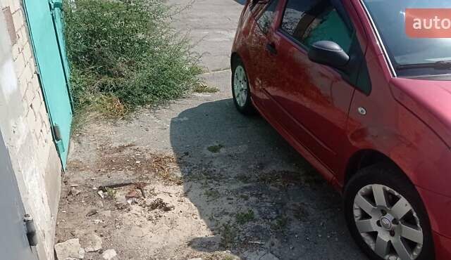 Червоний Сітроен С2, об'ємом двигуна 1.1 л та пробігом 122 тис. км за 4000 $, фото 6 на Automoto.ua